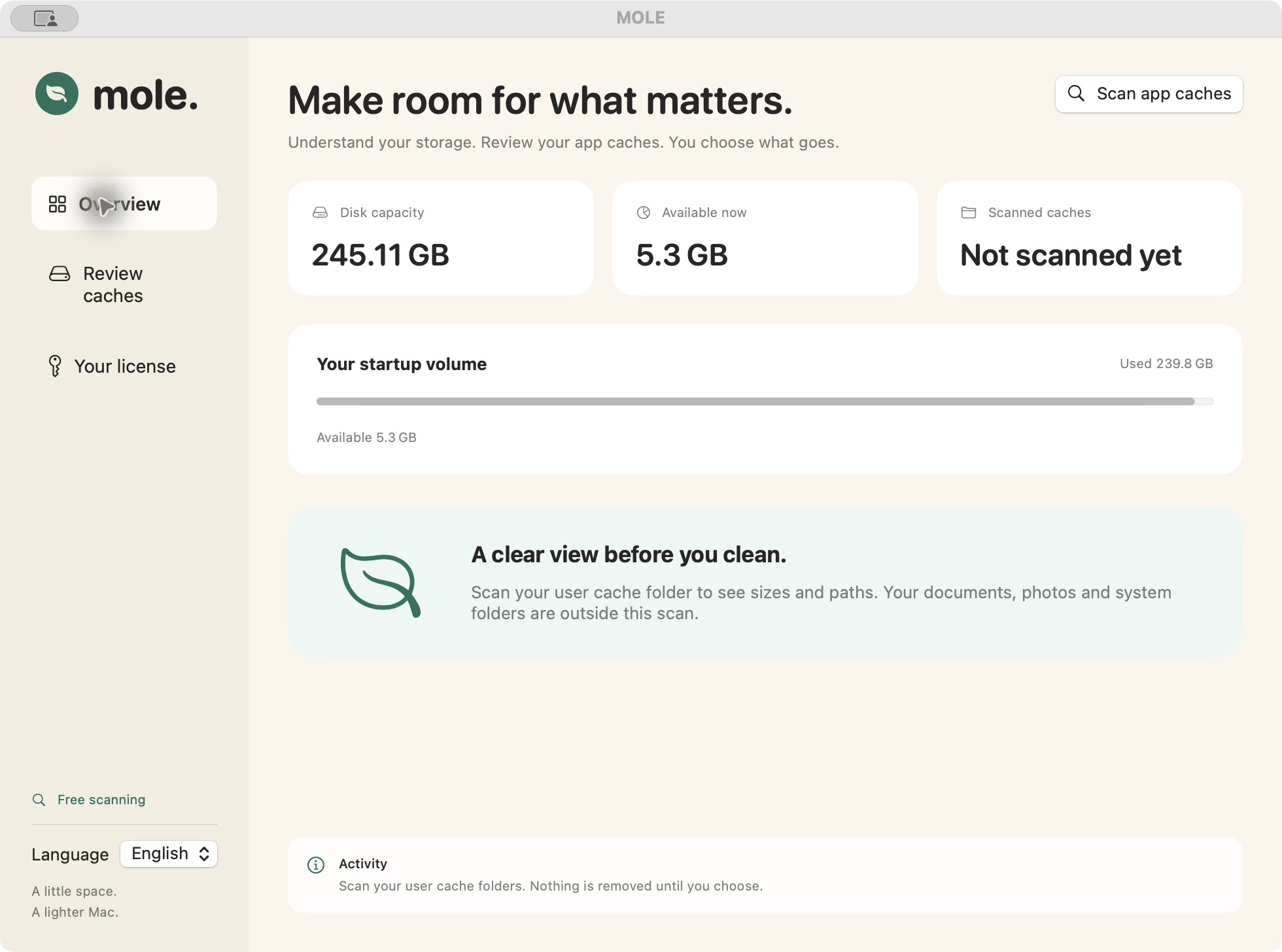 MOLE native Mac app showing disk capacity, available space and a cache scan summary.
